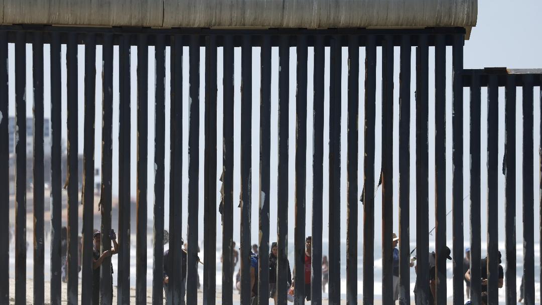 Trump Orders Border Wall Painted Black to Deter Climbers